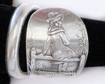 Little Bo Peep sterling silver spoon ring, Nursery rhyme, girl sitting on a fence. Durgin hallmark,  Antique ring.