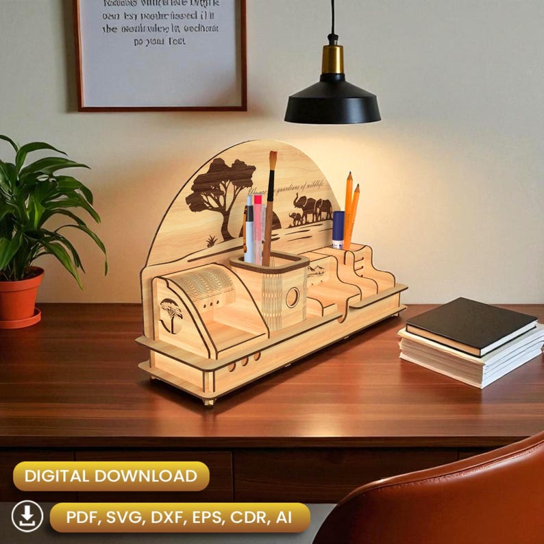 May include: A wooden desk organizer with a laser-cut design featuring a tree and elephants. It has compartments for pens, pencils, and other stationery items. The text "guardians of wildlife" is visible on the organizer. The words "DIGITAL DOWNLOAD" and file types are also visible.