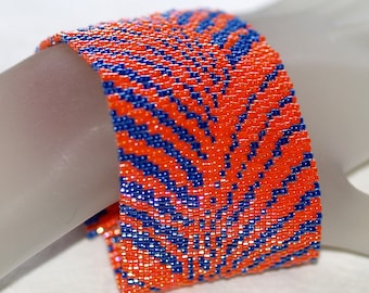 To and Fro / Beadwoven Peyote Cuff Bracelet / Brilliant Orange and Midnight Blue Waves or Rays / Contrasting Colors / Mod Cuff Bracelet