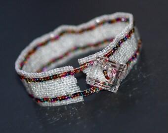 Pizzazzle / Narrow Striped Peyote Cuff Beadwoven Bracelet / Beaded Jewelry / Crystal Clear and colorful Metallic Beads & Clear Button