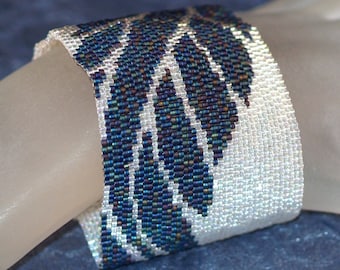 Feather / Wide Peyote Bead Cuff Bracelet / Peacock Blue, Clear Crystal Beads / Beadwoven Feather Design / Beaded Loop and Toggle Closure  /