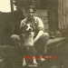 Happy vintage dog animal floppy ears overalls rural barn outdoor vernacular photo snapshot