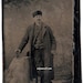 Man occupational book tintype photographer chair coat backdrop