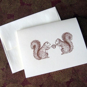 Two Squirrels and an Acorn Illustration Note Card image 1