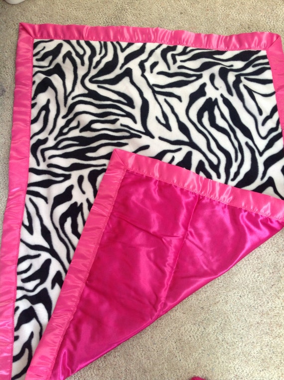Items similar to Baby blanket Zebra stripe polar fleece with Hot Pink Satin Back and Binding on Etsy