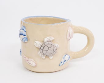 Handmade Ceramic Sea Turtle Mug with Pearl Finish – Coastal Coffee Cup