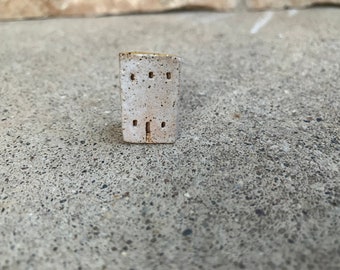 kiln fired clay house bead, white house with a yellow roof