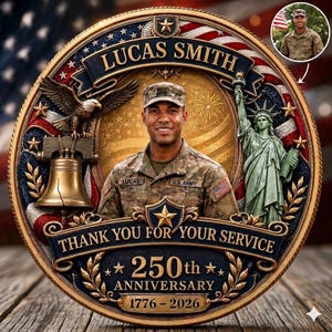 May include: A commemorative coin featuring a portrait of Lucas Smith in a U.S. Army uniform. The coin includes an eagle, the Liberty Bell, the Statue of Liberty, and the text "THANK YOU FOR YOUR SERVICE" and "250th ANNIVERSARY 1776-2026". The design incorporates American flag elements.