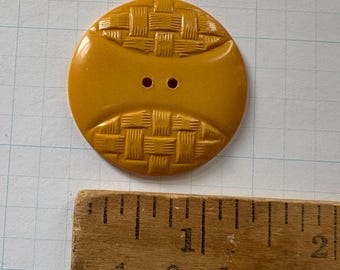 Botón de plástico amarillo suave de diseño tejido