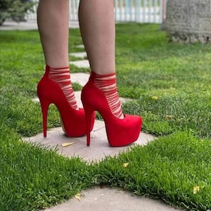 Red heels with elastic and zipper at the back!!!!