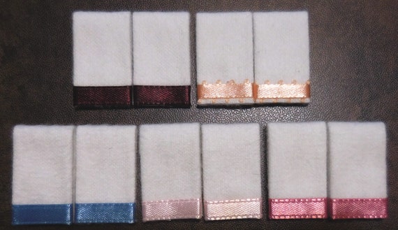 white towels with green trim