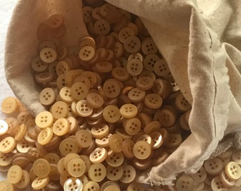 70 Light Orange Buttons, Varying Shades (7/16" Diameter)