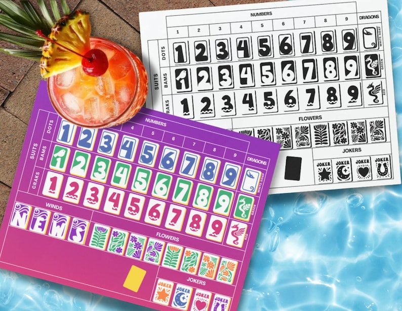 May include: A vibrant image featuring two game boards with numbers, suits, and dragon symbols. A colorful cocktail with a pineapple slice and cherry garnish sits atop one board. The boards are designed for a card game.