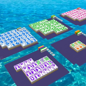 May include: An overhead shot of a digital game board floating in water. The game boards are various colors and feature numbers and symbols. The game boards are on a blue background.