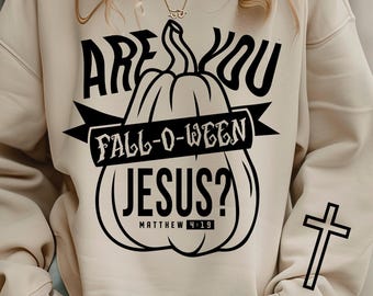 May include: A beige sweatshirt with the text "ARE YOU FALL-O-WEEN JESUS?" in black, featuring a pumpkin graphic. A cross is on the right sleeve. The words "ONLY DIGITAL DOWNLOAD" are on the left side. "INSTANT DOWNLOAD" is on the right.