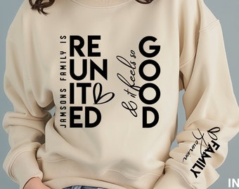 May include: A beige sweatshirt with black text that reads "Jamisons Family is Reunited & it feels so Good" and "Family Reunion" on the sleeve.