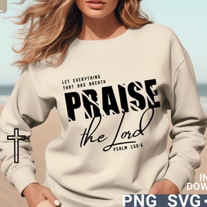 May include: A white sweatshirt with a black graphic design that says "Let everything that has breath praise the Lord, Psalm 150:6". The graphic design has a zebra print pattern.