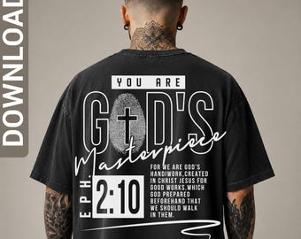 May include: A black t-shirt featuring white text on the back that reads YOU ARE GOD'S MASTERPIECE, with a fingerprint graphic containing a cross, and the scripture reference EPH. 2:10 followed by the full verse text in a clean, modern font.