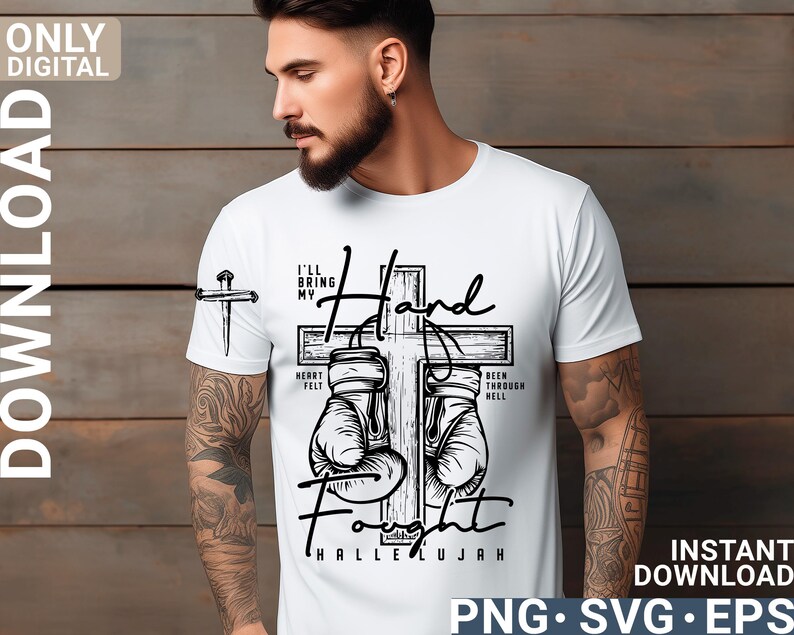 May include: White t-shirt with a black graphic design featuring a cross, boxing gloves, and the words "I'll Bring My Hand Fight Hallelujah." The design includes the text "Heart Felt" and "Been Through Hell."