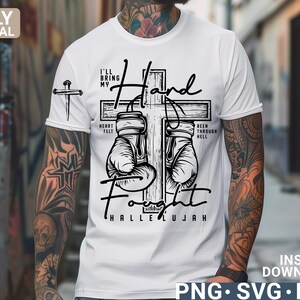 May include: White t-shirt featuring a black graphic of boxing gloves forming a cross, with the words "I'll Bring My Hand, Heart Felt, Been Through Hell, Fight, Hallelujah." A small cross is on the left sleeve. Instant download available.