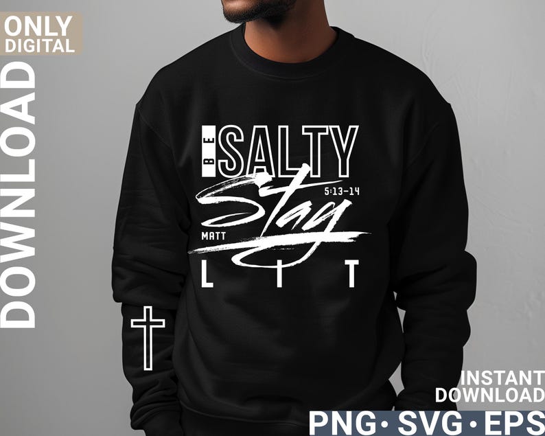 May include: Black sweatshirt with the words "BE SALTY STAY LIT" in white script. The text includes the Bible verse Matthew 5:13-14 and a cross graphic. The words "ONLY DIGITAL DOWNLOAD" are on the left side.