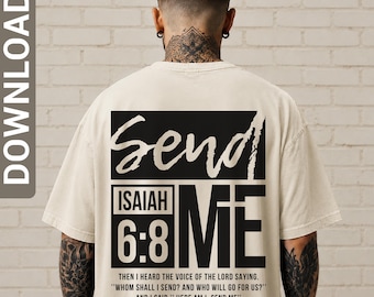 May include: A beige short-sleeve t-shirt featuring a large black graphic on the back. The design includes the text "Send" in a script font, "ISAIAH 6:8" in a block font, and the word "ME" in large letters, followed by the full Bible verse.