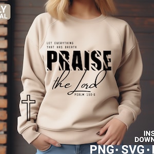 May include: A beige sweatshirt with a black graphic design that says "Let everything that has breath praise the Lord, Psalm 150:6".