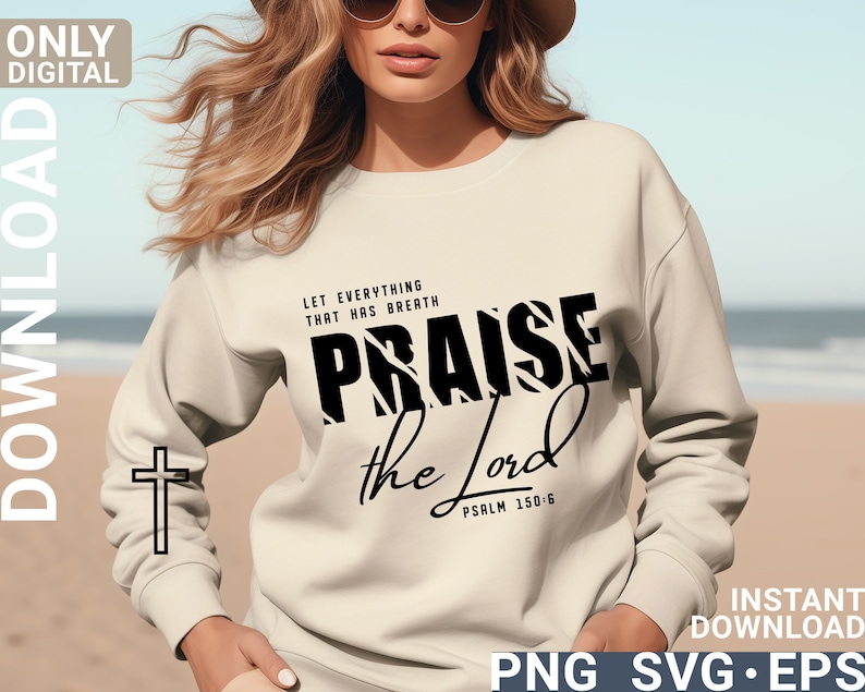 May include: A white sweatshirt with a black graphic design that says "Let everything that has breath praise the Lord, Psalm 150:6". The graphic design has a zebra print pattern.