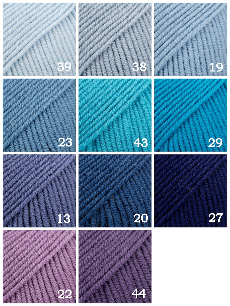 May include: A collection of 10 yarn skeins in various shades of blue, teal, purple, and gray. The skeins are arranged in a grid pattern with numbers 19, 38, 39, 29, 43, 23, 27, 20, 13, 44, and 22 printed on each skein.