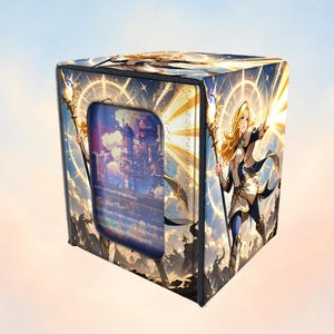 May include: A rectangular deck box for trading cards featuring a blonde character in white and blue armour holding a staff. The box displays a bright sunburst background and a central window showing a card with a fantasy building illustration.