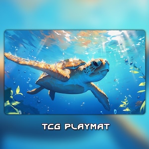 May include: A rectangular TCG playmat featuring a sea turtle swimming underwater. The turtle has a brown and orange shell and is surrounded by bubbles and sunlight. The words "TCG PLAYMAT" are at the bottom.