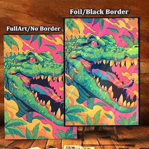 May include: Two colorful art prints featuring a stylized alligator with an open mouth, vibrant green scales, and a pink tongue. One print has a black border and the text "Foil/Black Border". The other print is "FullArt/No Border".