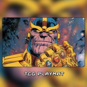 May include: A rectangular TCG playmat featuring a comic book illustration of the character Thanos with purple skin, a blue and gold helmet, and a gold gauntlet adorned with colorful stones. The background depicts a dark, starry cosmic space scene.