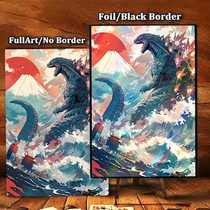 Puede incluir: Dos impresiones artísticas que representan una criatura similar a Godzilla emergiendo de las olas del océano, con un sol rojo y una montaña nevada en el fondo. Una impresión tiene un borde negro, la otra no. Las impresiones se exhiben sobre una superficie de madera.