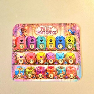 May include: A rectangular card titled Fairy Post Office featuring three rows of colourful illustrations. The top row shows six mailboxes, the middle row displays six envelopes, and the bottom row depicts six wrapped gifts, all marked with £1 or £2 symbols.