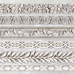 May include: A set of six decorative trim moldings with intricate floral and geometric designs. The moldings are white and have a raised, textured surface.