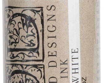 May include: A white bottle of Iron Orchid Designs Decor Ink in Mixing White. The bottle is labeled with the brand name, product name, and color. The bottle contains 2 fluid ounces of ink.