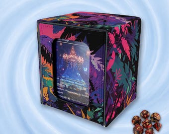 May include: A square deck box featuring a vibrant tropical leaf pattern in shades of pink, purple, and teal. The front displays a clear window revealing a trading card with a chandelier illustration. Seven multi-faceted dice with red and black colors.