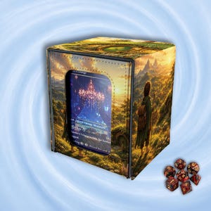 May include: A rectangular deck box featuring a fantasy landscape illustration with a figure in a cloak, a central window displaying a trading card with text, and a set of seven red and black polyhedral dice positioned to the lower right.