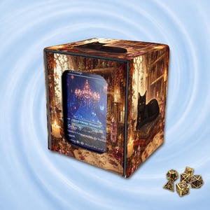 May include: A square deck box featuring a printed illustration of a black cat in a library setting with candles and books. A clear window displays a trading card with text including Island Swamp Mountain. Five gold-colored polyhedral dice are nearby.