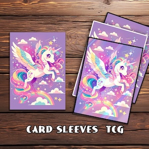 May include: Purple card sleeves with a colorful illustration of a winged unicorn, rainbow, clouds, and stars. The text "CARD SLEEVES TCG" is at the bottom. The sleeves are designed for trading card games.