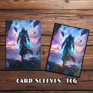 May include: Two card sleeves with a fantasy illustration of a robed figure with glowing blue hands and weapons, set against a backdrop of floating rocks and a colourful sky. The text "CARD SLEEVES TCG" is at the bottom.