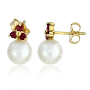 May include: Gold earrings with a pearl and three red gemstones.