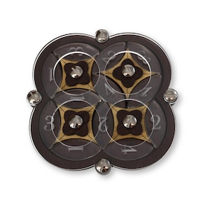 May include: A wooden puzzle with four circular sections, each with a clear plastic overlay and a central decorative element. The puzzle is held together with silver screws. Numbers 1-4 are visible on the circular sections.