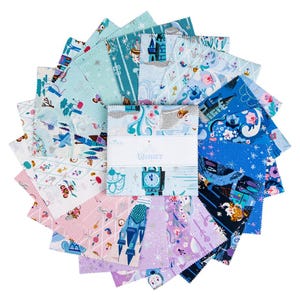 May include: A stack of square fabric swatches arranged in a fan pattern, featuring various prints in shades of blue, pink, and purple. A white paper band wraps around the center, displaying the text "WISHES" and a small clock tower illustration.