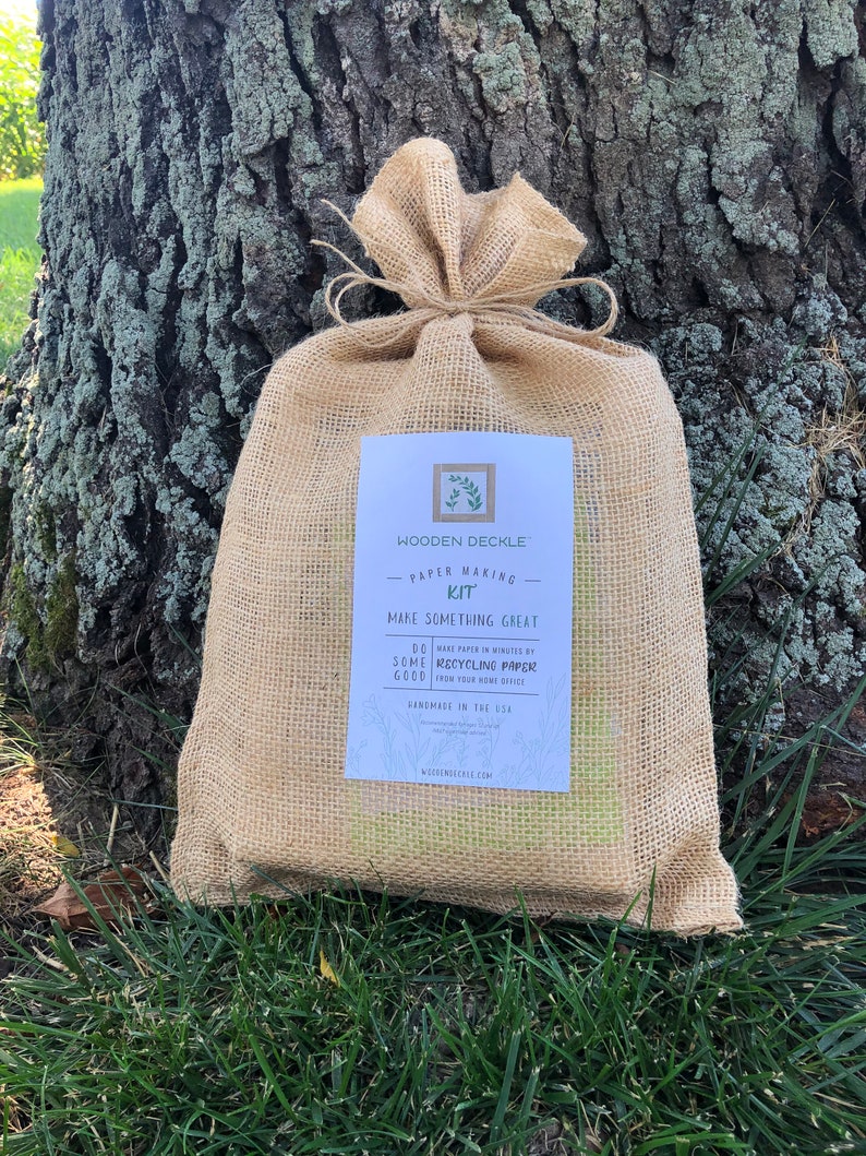 The eco friendly burlap bag containing this WoodenDeckle papermaking kit.
