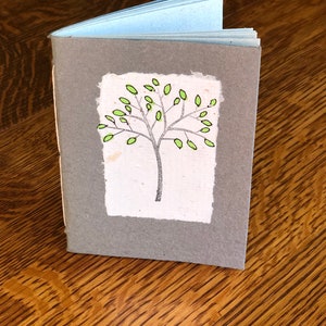 A handbound journal with 3x4" handmade paper.