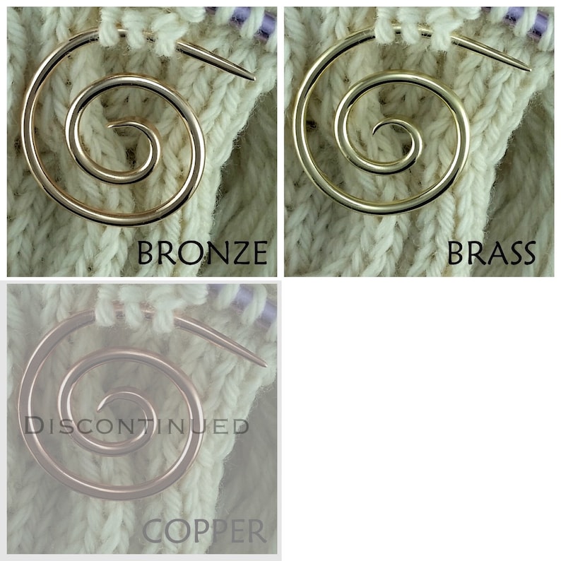 May include: Three metal knitting stitch markers in the shapes of a spiral. The markers are shown on a white knitted fabric. The markers are bronze, brass, and copper.
