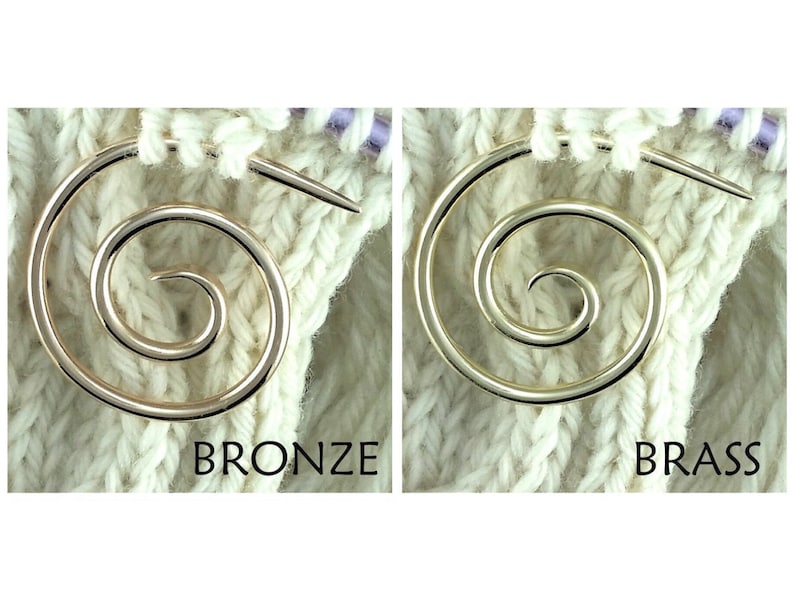 May include: Two close-up images of a spiral knitting stitch holder. The left image shows a bronze stitch holder and the right image shows a brass stitch holder. Both stitch holders are on a white knitted fabric.