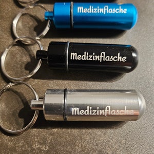 Pillendöschen und Geocaching am Schlüsselbund oder Anhaenger